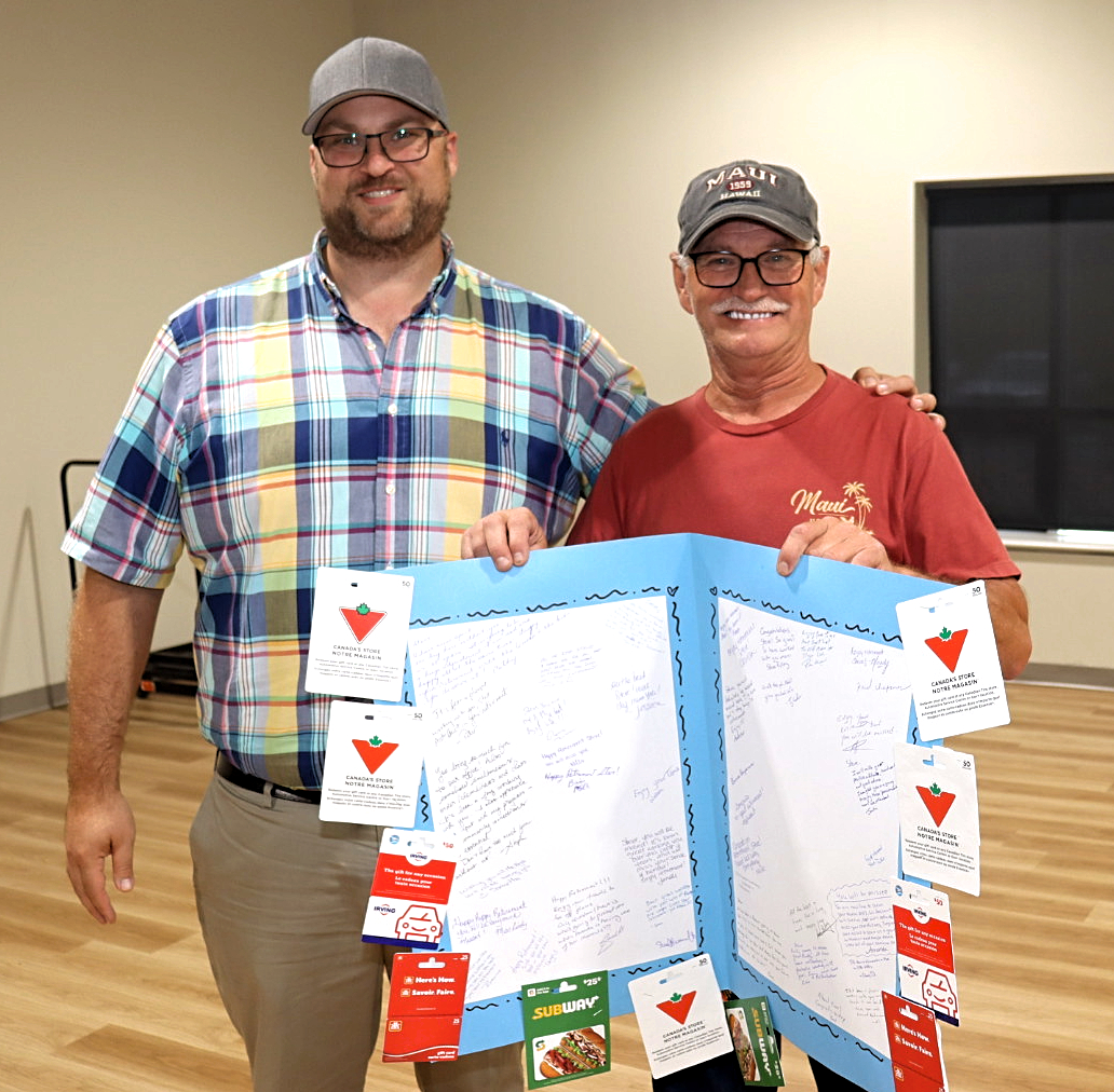 Director of Public Works Justin Waugh-Cress (left) presents a card from staff to Steve Varner of Facility Maintenance upon his retirement after 37 years with the former town of Springhill and the Municipality of Cumberland. Darrell Cole – Municipality of Cumberland